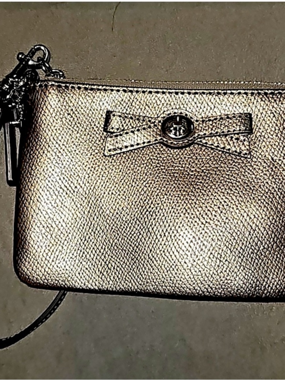 Coach Gold Wristlet with Bow Accent